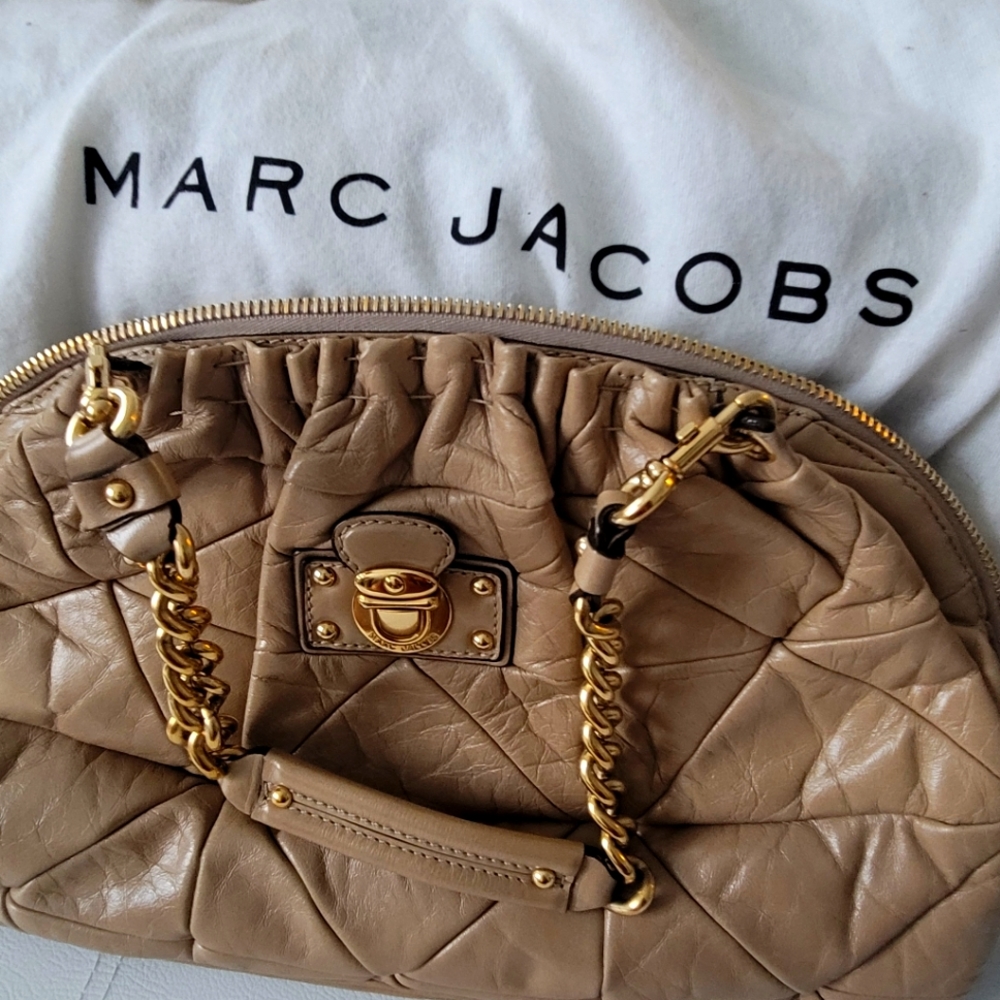 MJ tan pocketbook